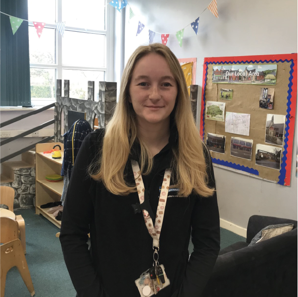 Teacher standing in a classroom
