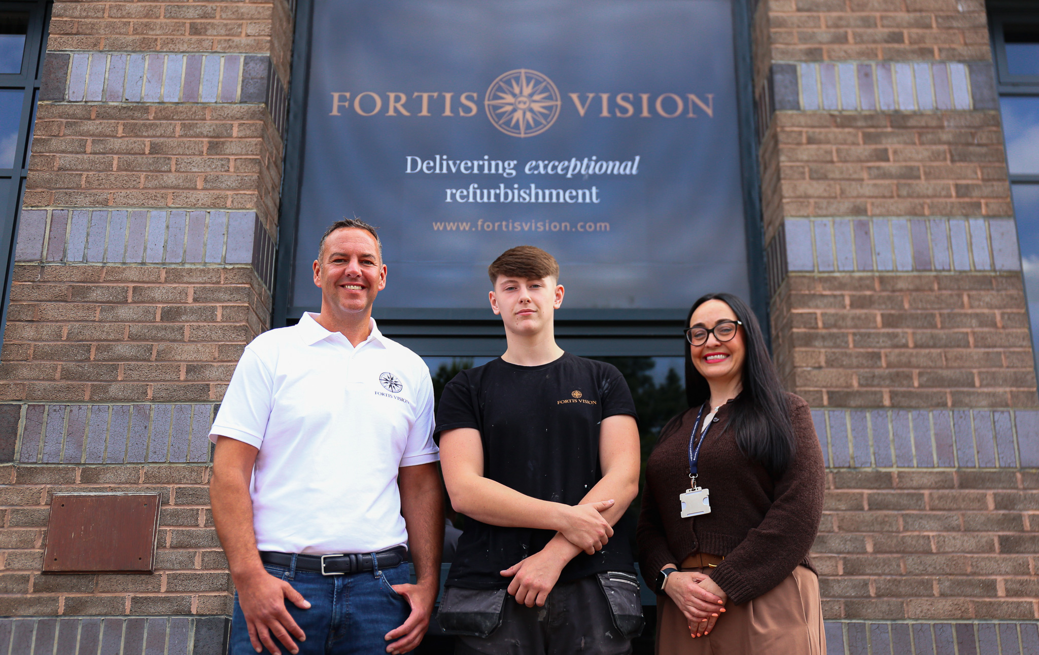 Apprentice of the Year winner, Josh Slack, outside workplace Fortis Vision.